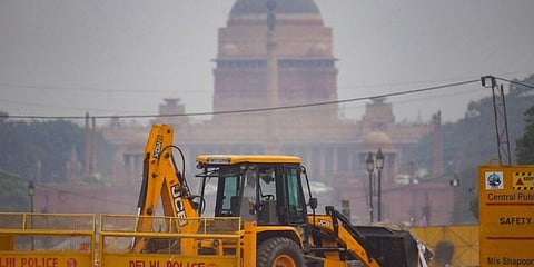 Construction work underway as part of the Central Vista Redevelopment Project, at Rajpath in New Delhi. (Photo | PTI)
