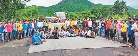 Protestors at NH-49 in odisha's Mayurbhanj demand better roads. (Photo| EPS)