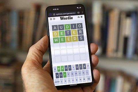 A Wordle game is seen on a mobile phone. (Photo | AP)