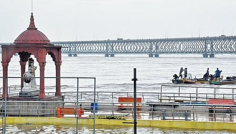 The flooded Godavari River at Saraswathi ghat at Rajamahedravaram in Andhra Pradesh on Saturday | Express