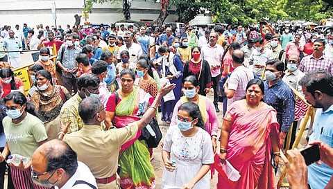 Candidates entering an exam hall in Chennai on Sunday |  R Satish Babu