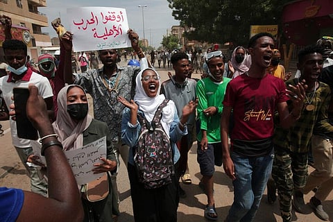 Sudanese demonstrators take to the streets calling for civilian rule and denouncing the military administration, in Khartoum, Sudan, on July 17, 2022.  (Photo | AP)