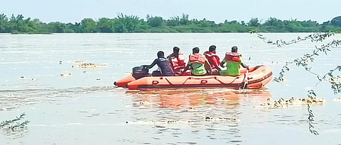 Fire and rescue personnel searching in the Kollidam. (Photo| EPS)