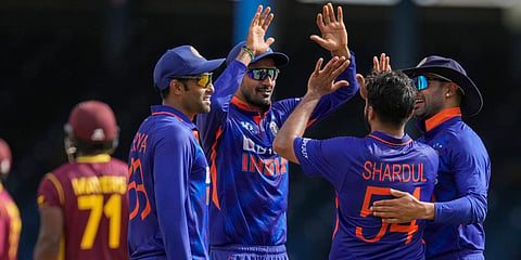 Teammates congratulate India's Shardul Thakur after the dismissal of West Indies' Kyle Mayers during the first ODI at Queen's Park Oval in Port of Spain. (Photo| AP)
