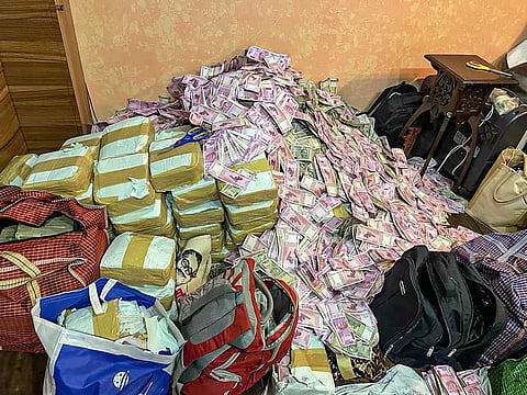Rs 20 crore cash seized by ED from the premises of an aide of West Bengal minister Partha Chatterjee after the agency conducted raids on Friday. (Photo | PTI)