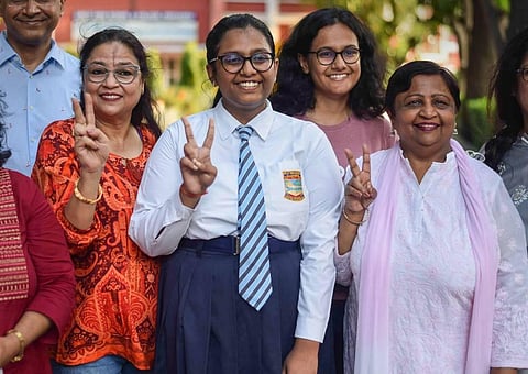 Ananya Agarwal celebrates after the declaration of Indian School Certificate Examinations (ICSE) Class 12th exam results, in Prayagraj, Sunday, July 24, 2022.  (Photo | PTI)