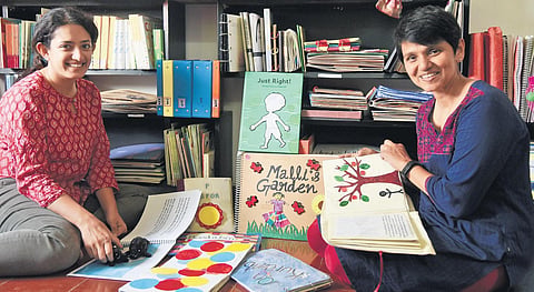 Teresa Antony and Namita Jacob with the books |  r satish babu