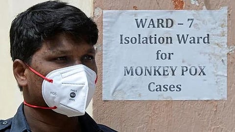 A security guard stands at the entrance of an isolation ward for monkeypox patients at a government hospital in Hyderabad on July 25, 2022. (Photo | AFP)