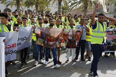 Protesters demonstrate in Martyrs Square in  Libya calling for an election and protesting against the government and parliament. (Photo |AP)