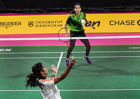 Indian shuttler Pusarla Venkata Sindhu in action against Shahzad Mahoor of Pakistan in group league match of Commonwealth Games 2022. (Photo | PTI)