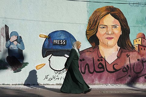 A mural of slain of Al Jazeera journalist Shireen Abu Akleh adorns a wall, in Gaza City. (File Photo | AP)
