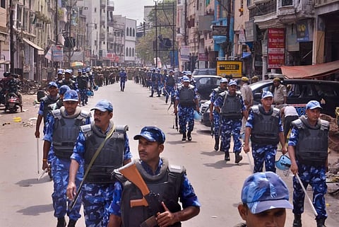 Security personnel patrol to maintain law and order amid communal tension, in the wake of Friday's violence, in Kanpur. (Photo | PTI)
