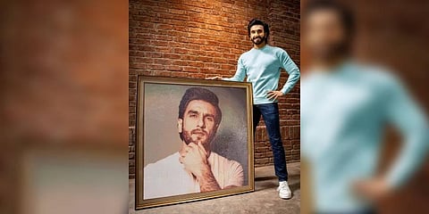 Ranveer Singh poses with his birthday gift, a portrait of Ranveer bedazzled with 100,000 crystals.  (Photo | Instagram)