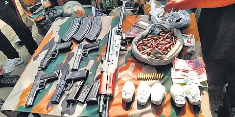 Arms and ammunition recovered from militants. (Photo | EPS)
