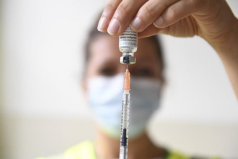 A health professional prepares a dose of a Monkeypox vaccine at the Edison municipal vaccination centre in Paris. (Photo | AP)