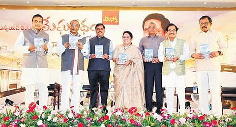 Prof Acharya N Gopi releases MD HMRL NVS Reddy’s poetry  book titled ‘Megapatham’ in Hyderabad on Tuesday
