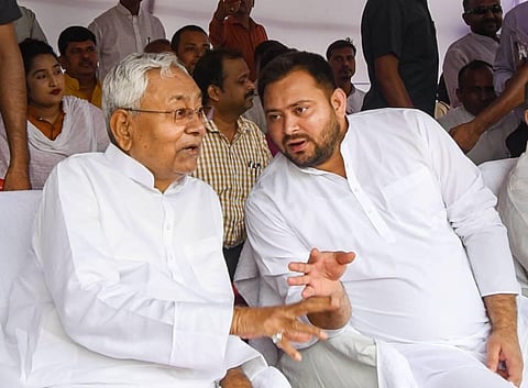 Bihar Chief Minister Nitish Kumar with Deputy CM Tejashwi Yadav at a function after paying tributes at Shaheed Smarak, in Patna. (Photo | PTI)