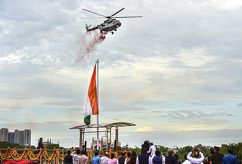 Helicopters shower flower petals during the function at the Red Fort. (Photo |PTI)