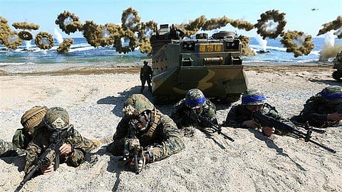 South Korean and US soldiers take a position during annual joint military drills in a South Korean coast. (File | AFP)