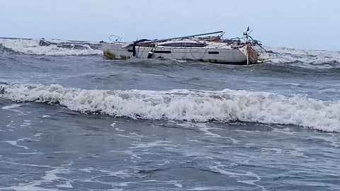 A suspicious boat with three AK-47 rifles and bullets found off the Raigad coast in Maharashtra, Thursday, Aug. 18, 2022. (Photo | PTI)