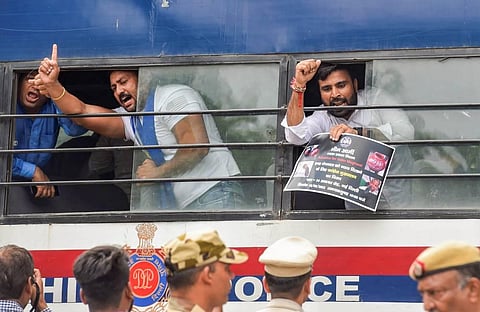Bhim Army activists being detained by security personnel during their protest over the Jalore (Rajasthan) incident, wherein a 9-year-old Dalit student was allegedly beaten to death. (Photo | PTI)