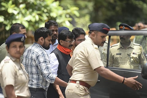 Shiv Sena MP Sanjay Raut being taken for a medical check-up by ED officials, after which he will be produced in a special court. (File Photo | PTI)