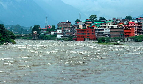 Kullu (HP): Swollen Beas river following heavy monsoon rain, in Kullu district, Saturday, Aug. 20, 2022. (Photo | PTI)