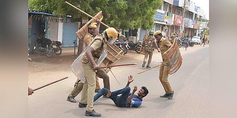 File photo of police personnel attacking an anti-Sterlite  protester. (Photo | Express)