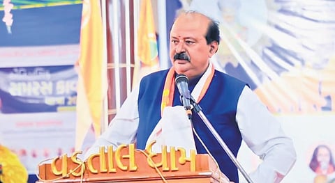 Gujarat leaders Purnesh Modi  (above) and Rajendra Trivedi were stripped of the Road and Building, and Revenue portfolios, respectively, on Saturday