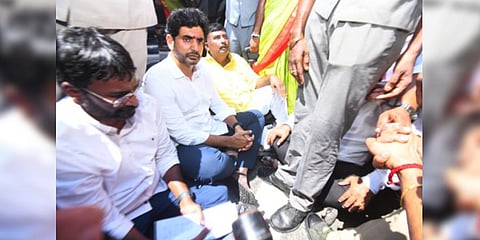 ral secretary Nara Lokesh staged a impromptu sit-in to protest against police action.