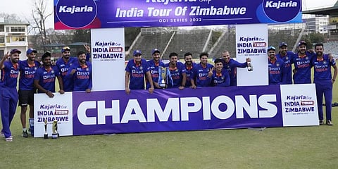 Indian cricket players pose for a photograph with the trophy after winning the series on the last day of the ODI match against Zimbabwe.(Photo | AP)