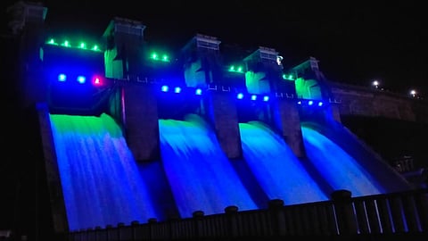 The reservoir wears a colourful look after the crest gate lights were repaired recently.