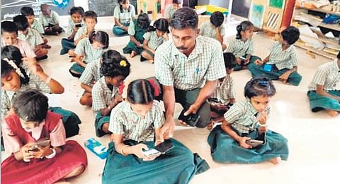 Ramachandran with his students at Keelambal Panchayat Union Primary School in Ramanathapuram district | Express