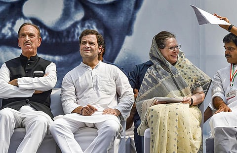 So close, yet so far: Ghulam Nabi Azad with Rahul & Sonia Gandhi.