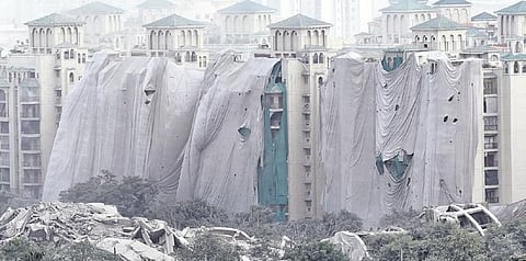 Officials ensured that nearby buildings were not damaged. (Photo | Parveen Negi, EPS)