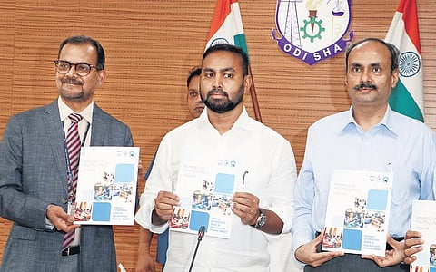 Skill Development and Technical Education Minister Pritiranjan Gharai releasing the ranks of polytechnics of Odisha in Bhubaneswar on Tuesday. (Photo | Irfana, EPS)