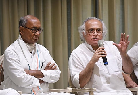 Senior Congress leader Jairam Ramesh with party leader Digvijaya Singh speaks during a press conference regarding party's 'Bharat Joda Yatra', in Thiruvananthapuram. (Photo | PTI)