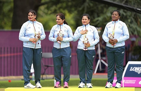 India's Lovely Choubey, Pinki Kaushik Singh, Nayanmoni Saikia and Rupa Rani Tirkey celebrate victory in the Women's Fours Lawn Bowls final. (Photo | AP)