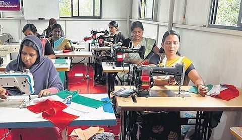 Kudumbashree members in Malappuram engaged in making national flags (File photo| Express)