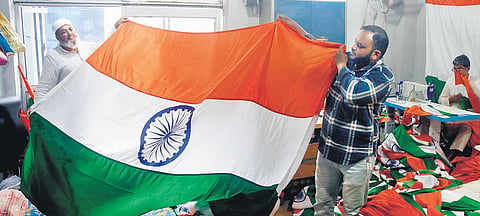 IN DELHI: Workers manufacture national flags at a shop in Sadar Bazar ahead of Independence Day. The sale of national flags has increased immensely | shekhar yadav