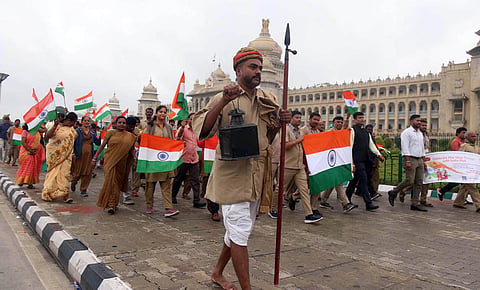 Postal staffers take out a roadshow in Bengaluru. (Photo | Express)