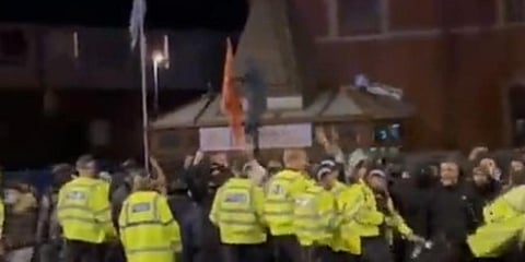 Videos circulating on social media showed a temple flag being ripped out. (Video screengrab)