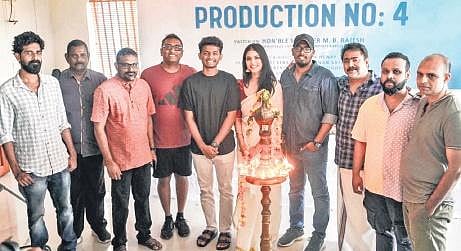 Malavika Mohanan and Mathew Thomas with the production team.