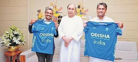 Chief Minister Naveen Patnaik with AIFF general secretary Shaji Prabhakaran (left) and AIFF president Kalyan Chaubey | Express