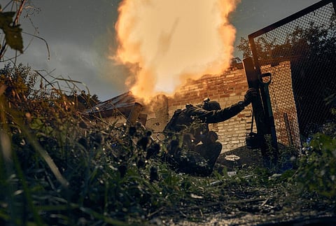 Ukrainian soldiers fire in the recently retaken Kupiansk in the Kharkiv region, Ukraine, Friday, Sept. 23, 2022. (Photo | AP)