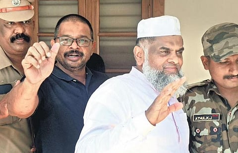 Police bringing out PFI leaders after producing them in the NIA Court in Kochi on Saturday | A Sanesh