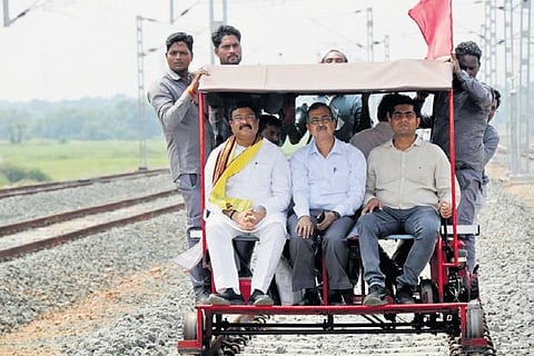 Dharmendra Pradhan with railway officials in the special carriage | Express