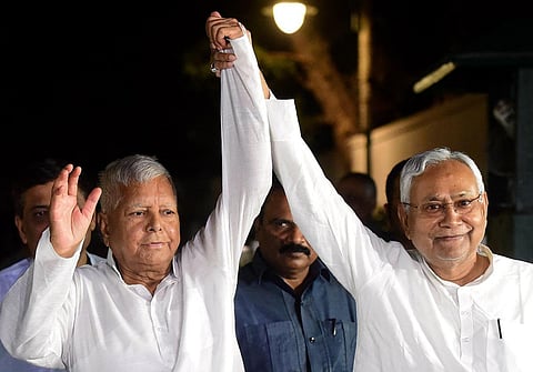 Bihar CM and JD(U) leader Nitish Kumar with RJD supremo Lalu Prasad after their meeting with Congress interim President Sonia Gandhi, in New Delhi on Sunday. (Photo | PTI)