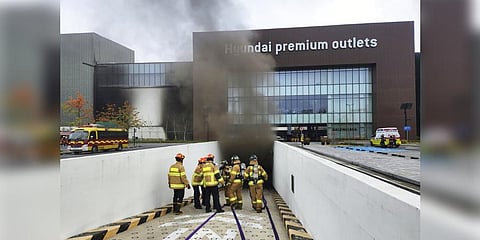 South Korean firefighters work at a shopping mall in Daejeon, South Korea. (Photo | AP)South Korean firefighters work at a shopping mall in Daejeon, South Korea. (Photo | AP)