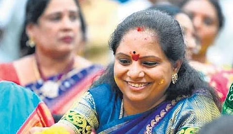 RS MLC K Kavitha arranges flowers during  celebrations held at Telangana Bhavan in Hyderabad